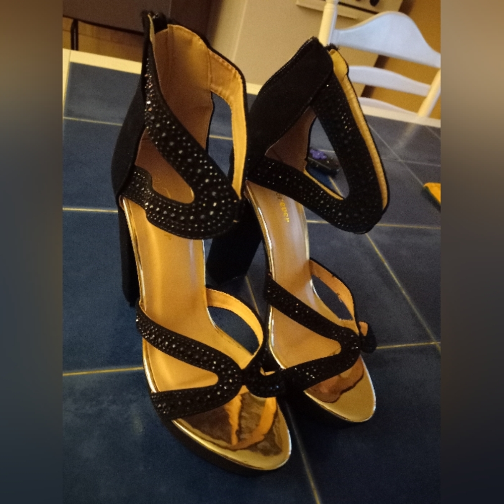 Women's black block heels.
